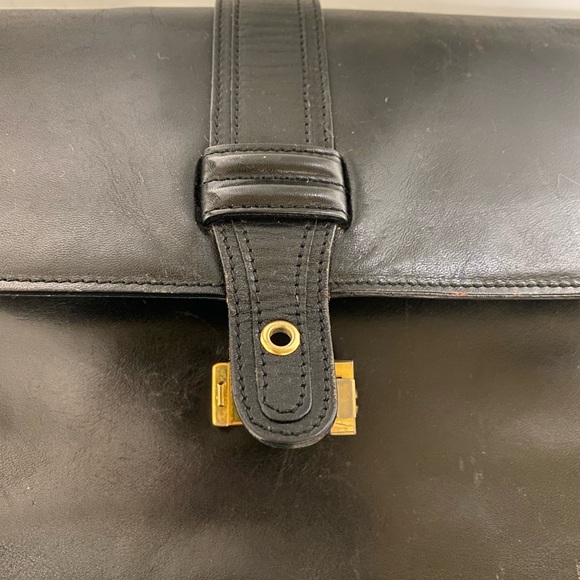 Bally Black and Gold Leather Wristlet Clutch with Elegant Clasp